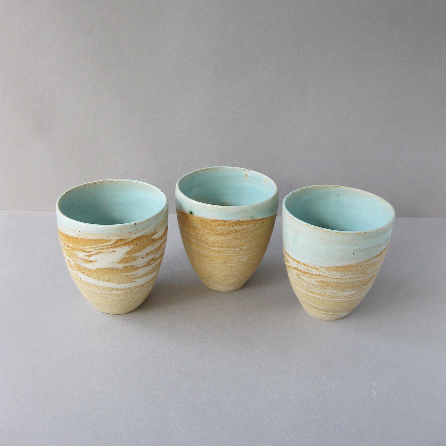 Porcelain Tall Tea Cup by Lai Montesca